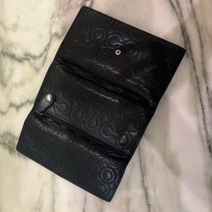Coach leather checkbook wallet in black in great condition